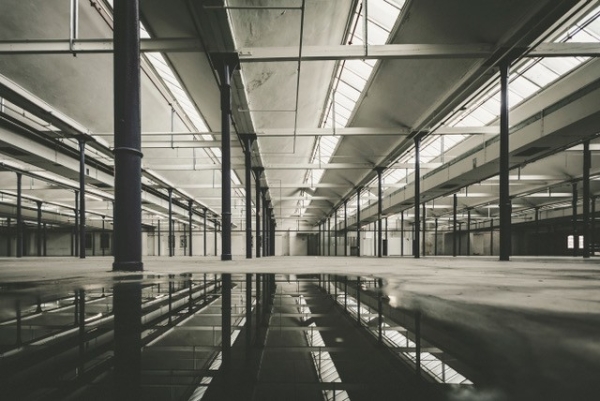 Photograph
                                          of a building hall in shades of gray