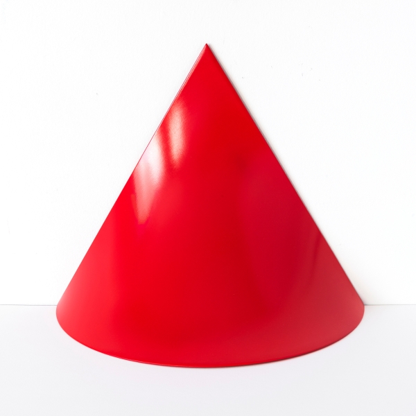 A red pylon against a white background