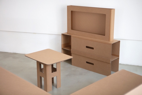 A table and TV made of cardboard